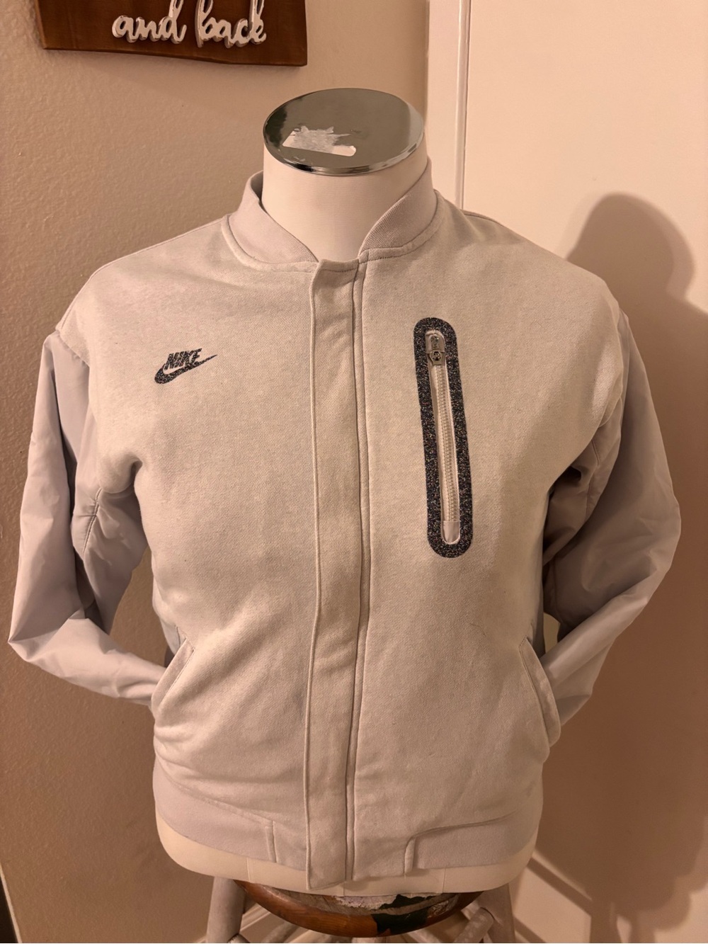 Nike Light Gray womens Bomber Jacket with Zip Pocket Detail